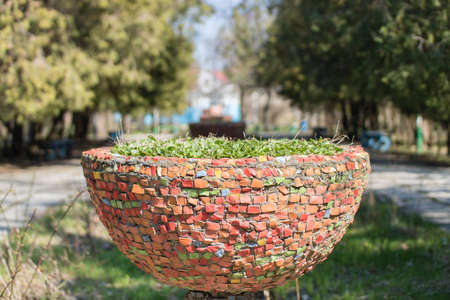 colorful outdoor vase in the park on a sunny dayの写真素材