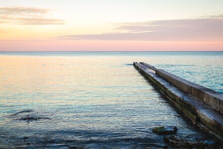View of the pier during sunset at the beachの写真素材