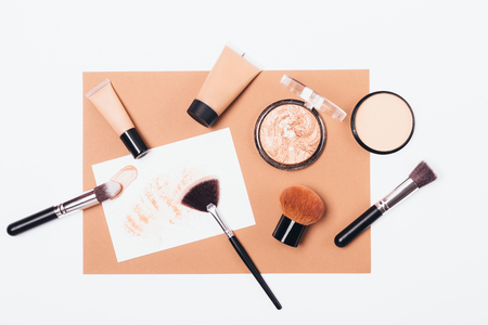 Makeup products for smooth and radiant complexion, top view, flat lay arrangement.の写真素材
