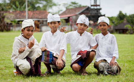 BALI - JANUARY 22. Balinese pilgrim children at Mother Temple in Besakih on January 22, 2012 in Bali, Indonesia. Most Balinese hindus make a yearly pilgrim to the mother of all temples in Bali.のeditorial素材