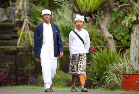 BALI - JANUARY 22. Balinese pilgrims at Mother Temple in Besakih on January 22, 2012 in Bali, Indonesia. Most Balinese hindus make a yearly pilgrimage to the mother of all templesのeditorial素材