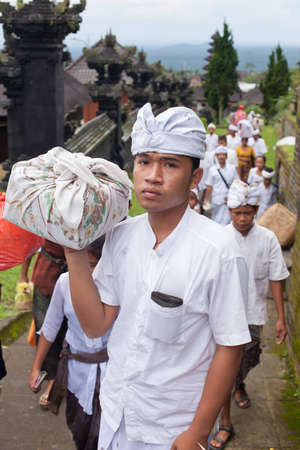 BALI - JANUARY 22. Balinese pilgrims at Mother Temple in Besakih on January 22, 2012 in Bali, Indonesia. Most Balinese hindus make a yearly pilgrim to the mother of all temples.のeditorial素材