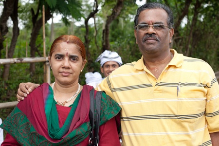 BALI - JANUARY 22. Indian Hindu pilgrim couple at Mother Temple in Besakih on January 22, 2012 in Bali, Indonesia. Indian hinduism is quite different to the animist Balinese hinduism.のeditorial素材