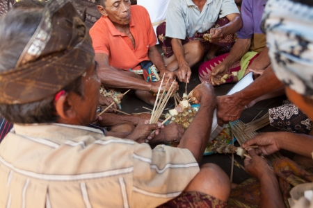 BALI - FEBRUARY 11. Villagers prepare food for wedding ceremony on February 11, 2012 in Bali, Indonesia. This fishing village community eat mostly pork.のeditorial素材
