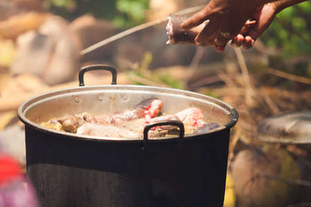 BALI - FEBRUARY 11. Villagers prepare food for wedding ceremony on February 11, 2012 in Bali, Indonesia. This fishing village community eat mostly pork.のeditorial素材