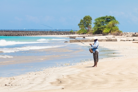 BALI - FEBRUARY 13. Line fishermen on Jimberan beach on February 13, 2012 in Bali, Indonesia. Local fishermen find it harder to make a living due to a lack of fish caused by industrial fishing.のeditorial素材