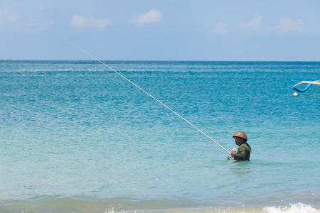BALI - FEBRUARY 13. Line fishermen on Jimberan beach on February 13, 2012 in Bali, Indonesia. Local fishermen find it harder to make a living due to a lack of fish caused by industrial fishing.のeditorial素材