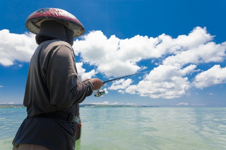 BALI - FEBRUARY 13. Line fishermen on Jimberan beach on February 13, 2012 in Bali, Indonesia. Local fishermen find it harder to make a living due to a lack of fish caused by industrial fishing.のeditorial素材