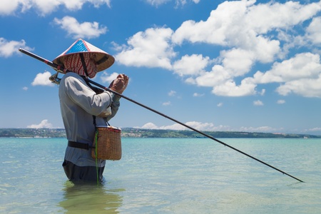 BALI - FEBRUARY 13  Line fishermen on Jimberan beach on February 13, 2012 in Bali, Indonesia  Local fishermen find it harder to make a living due to a lack of fish caused by industrial fishing のeditorial素材