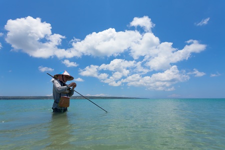 BALI - FEBRUARY 13  Line fishermen on Jimberan beach on February 13, 2012 in Bali, Indonesia  Local fishermen find it harder to make a living due to a lack of fish caused by industrial fishing のeditorial素材