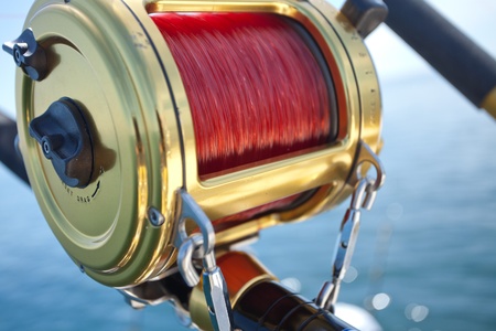 big game fishing reel in natural settingの写真素材
