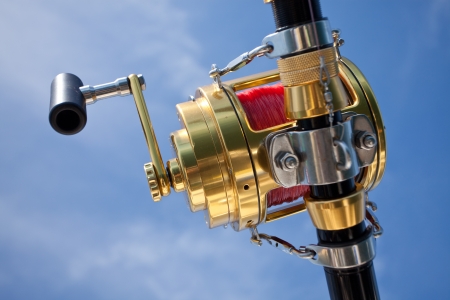 big game fishing reel in natural settingの写真素材