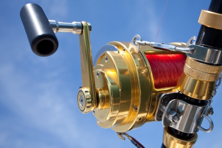 big game fishing reel in natural settingの写真素材