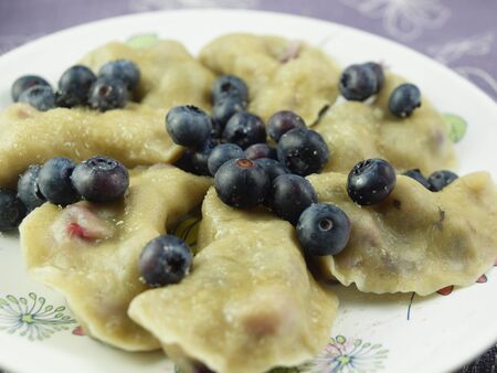 Polish traditional pierogi with blueberriesの写真素材