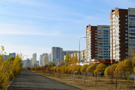 Row of old and new high-rise panel houses in the autumn cityの写真素材