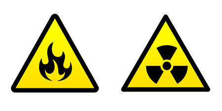 Two yellow signs of flammability and radioactive substanceのイラスト素材