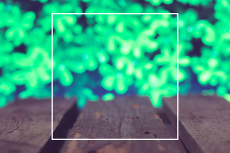 Wooden boards on a green spring background.の写真素材