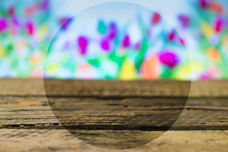 Old wooden board on a blurred background springの写真素材