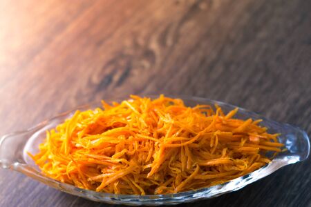 Grated carrot fresh salad on a plate.の写真素材