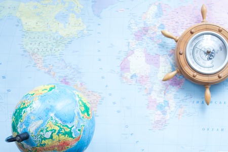 Globe on the background of the world map.