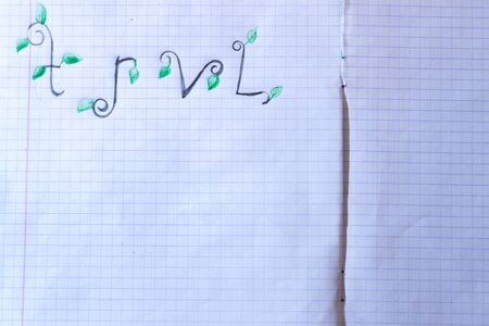 Inscription trvl on the white page of the notebookの写真素材