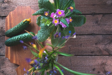 Fresh cucumber on a wooden backgroundの写真素材