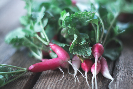 Fresh radish harvest on a wooden backgroundの写真素材