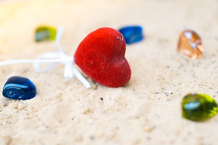 Hearts on sand on the beach concept of feelingの写真素材