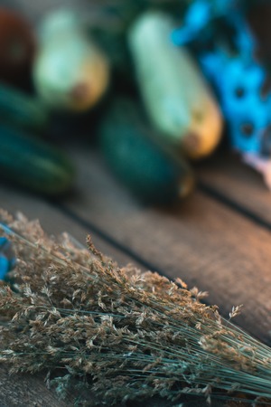 Sheaf of hay on a wooden backgroundの写真素材