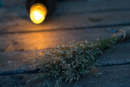 Sheaf of hay on a wooden backgroundの写真素材