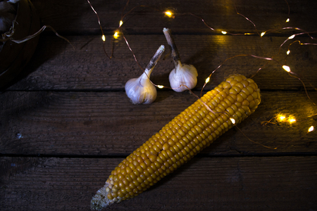 Still life of harvest of garlic and cabbage of cornの写真素材