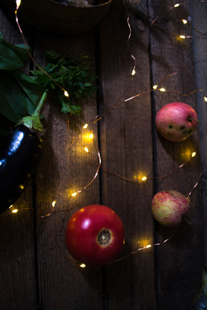 Garlic with apples on a wooden backgroundの写真素材