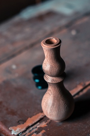 Wooden fragment ornament for shisha decoration on a wooden backgroundの写真素材