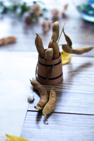 Beans on a wooden background. Autumn still lifeの写真素材