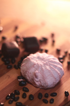 Marshmallow and other sweets on a wooden background still lifeの写真素材