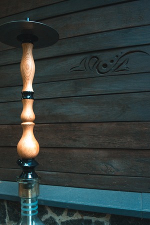 Hookah on a summer terrace with a blurred background