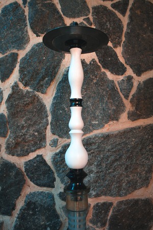 Hookah on a summer terrace with a blurred background