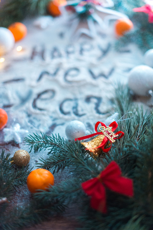 New Year's still-life. On a wooden background in the snowの写真素材