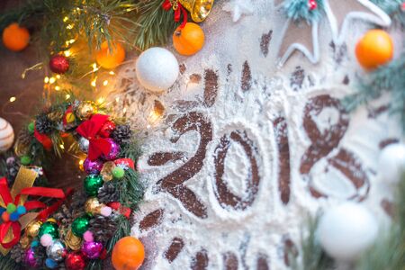 New Year's still-life. On a wooden background in the snowの写真素材
