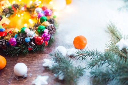 Christmas still-life with lights, ornaments on a white backgroundの写真素材