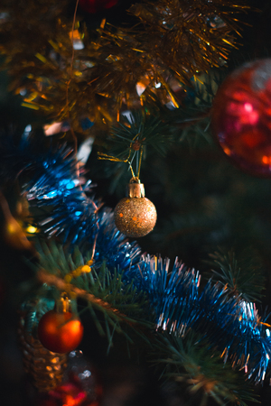 Christmas tree decorations with a blurred background on a Christmas treeの写真素材