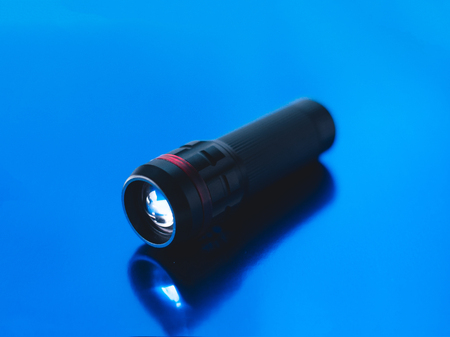 Lantern on a blue glossy blurred background