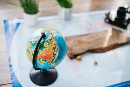 Still life on the political map of the world. The concept of travel.