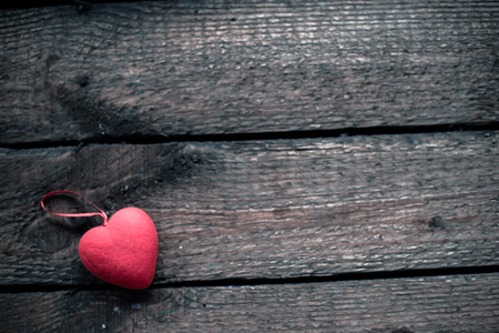 Hearts on a wooden old background. The concept for St. Valentine's Day.の写真素材