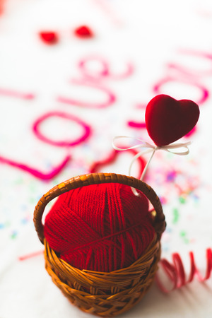 Inscription in knitted letters on a white background. St. Valentine's Day isolate.の写真素材