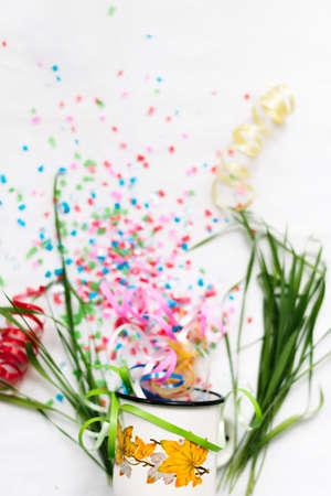 White mug with confetti isolate festive mocap.の写真素材