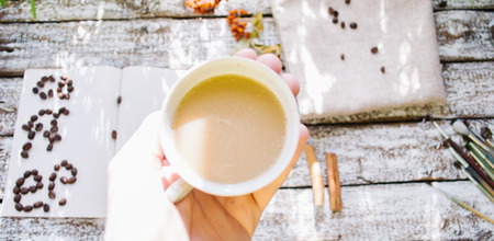 A cup of coffee in the morning sunの写真素材