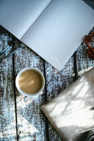 A cup of coffee in the morning sun