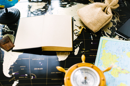 Map with traveler's accessories concept. Still life.の写真素材