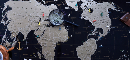 Black political map of the world. Still life of a traveler.の写真素材